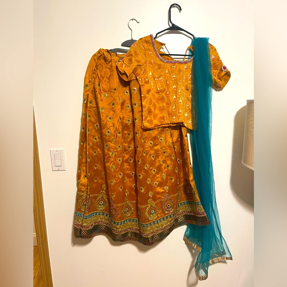 Pure silk Embroidered mustard yellow Lehenga with Blue Dupatta